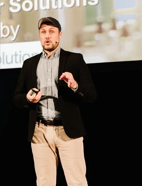 Jo speaking on stage